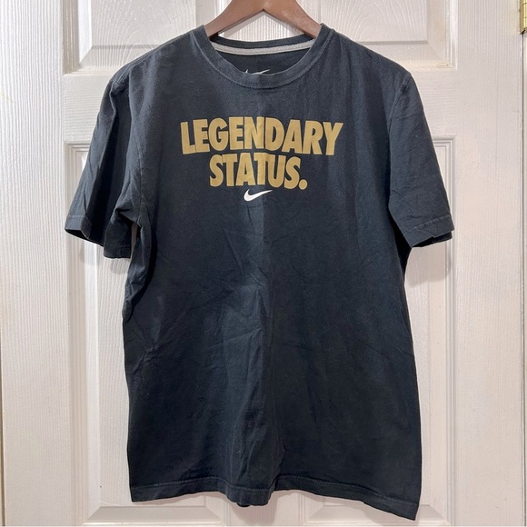 NIKE Legendary Status Men's Regular Fit T-shirt Black Gold Size Medium - Picture 1 of 5